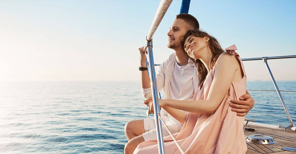 Happy couple sailing away