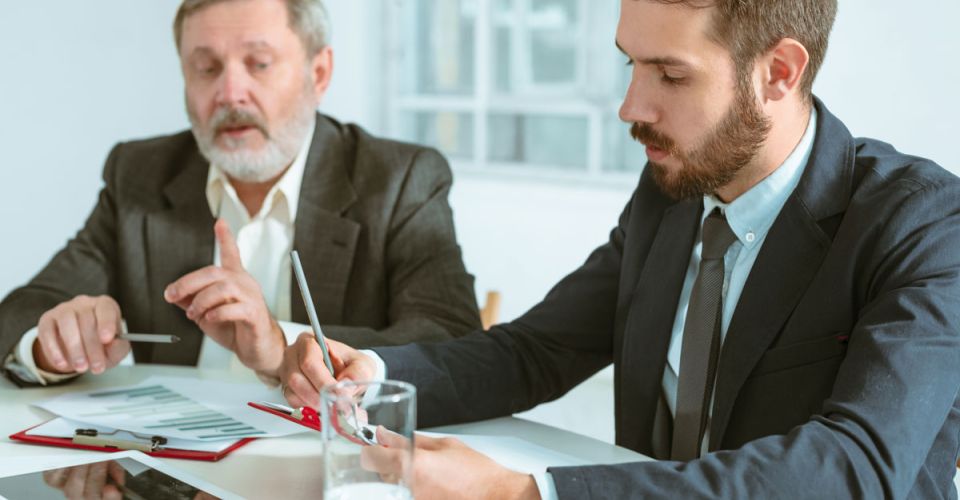 Two lawyers reviewing documents